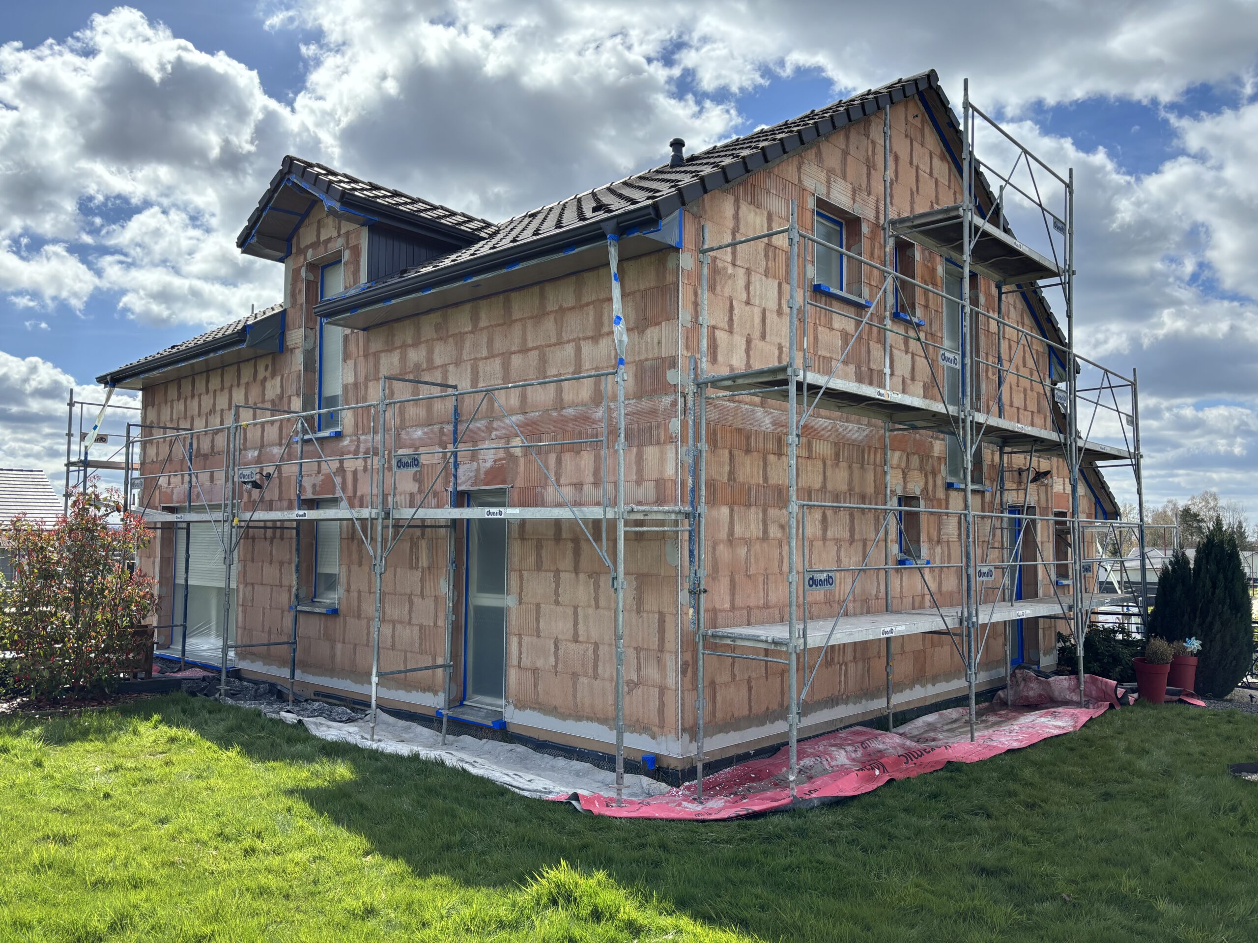 Préparation façade échafaudage protection huisseries angles soubassement chantier