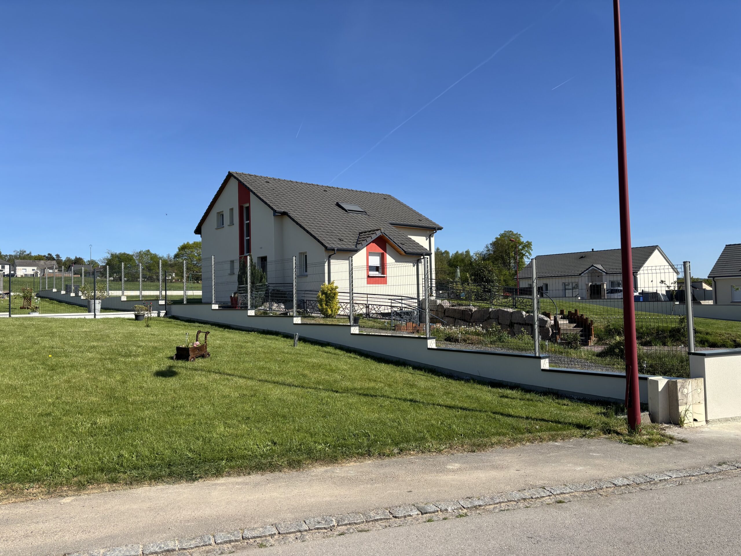 Murette neuve enduit finition extérieur construction maison Vosges