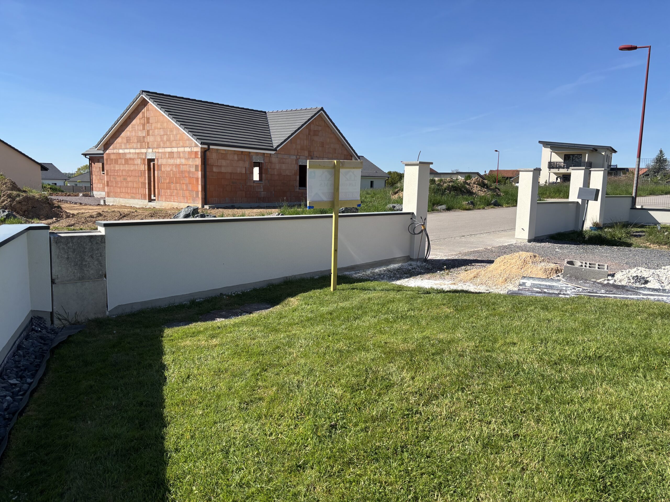 Enduit finition murette neuve chantier neuf extérieur maison Vosges