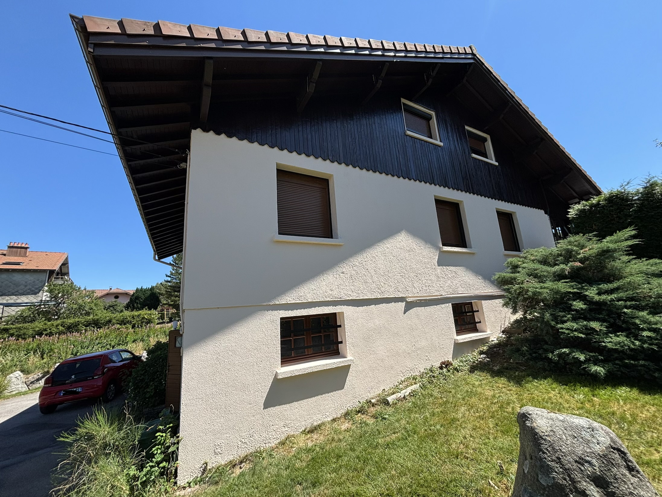 Rénovation d’un pignon avec peinture de façade, lasure du bardage, fenêtres et baie vitrée à Xonrupt-Longemer
